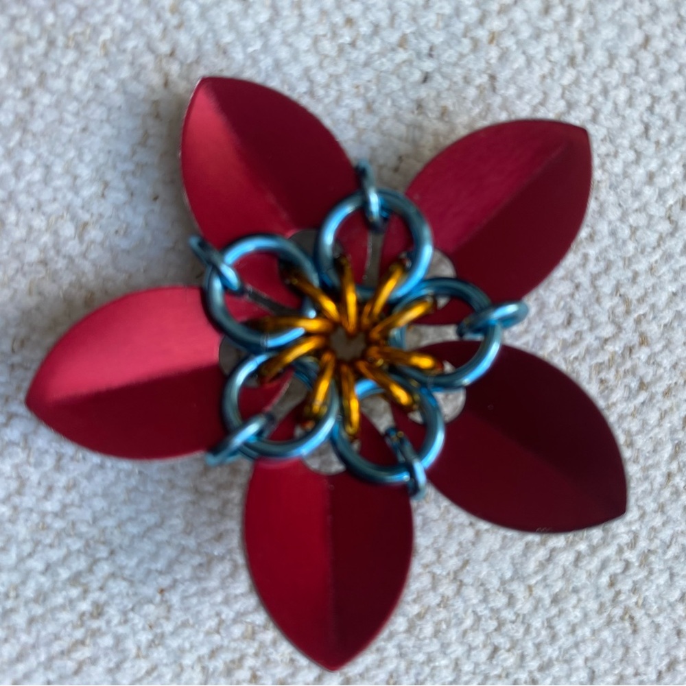 Red and Blue Artisan Flower Pendant.  Woman owned business
